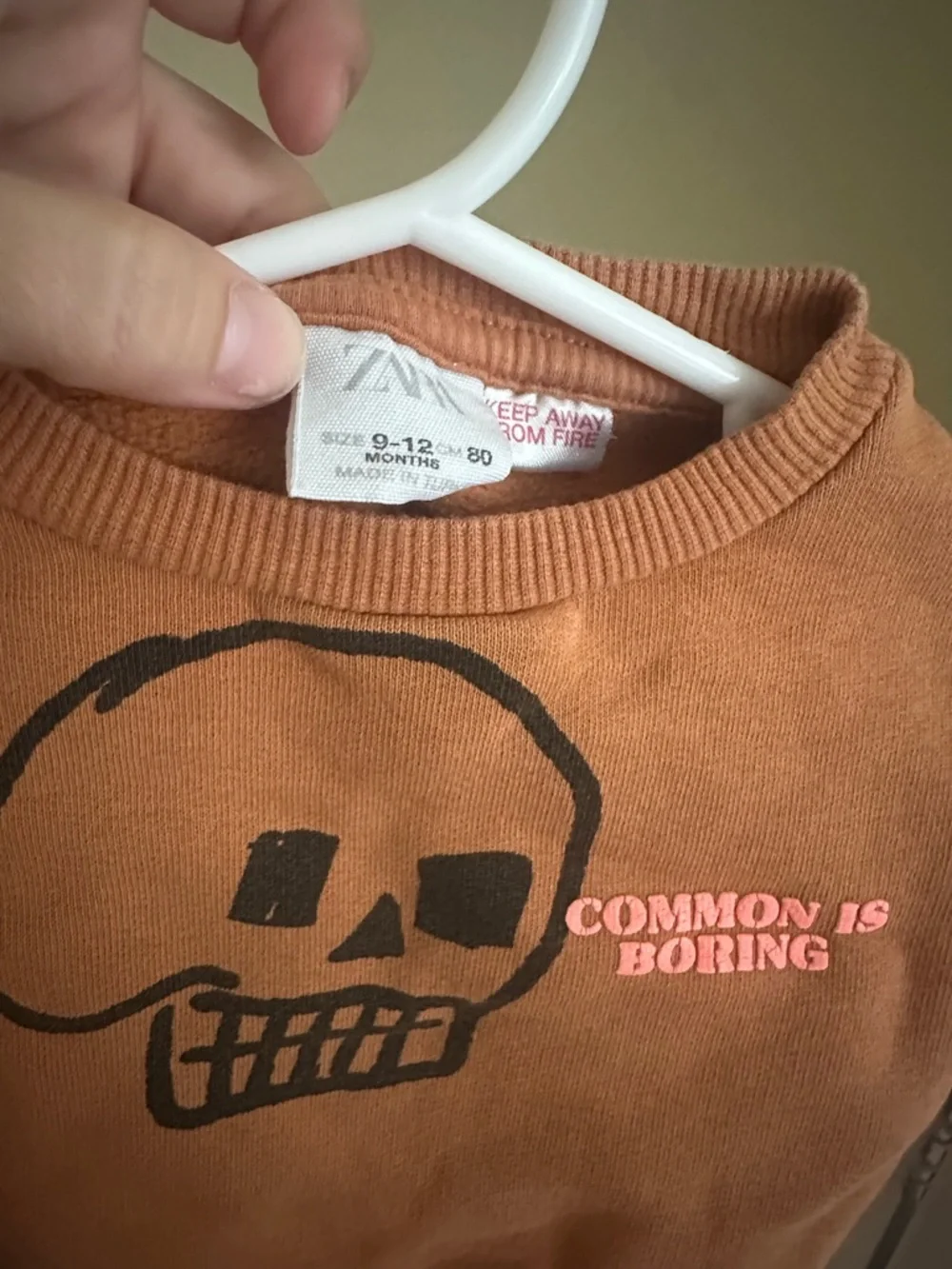 Zara “common is boring” skeleton sweatshirt